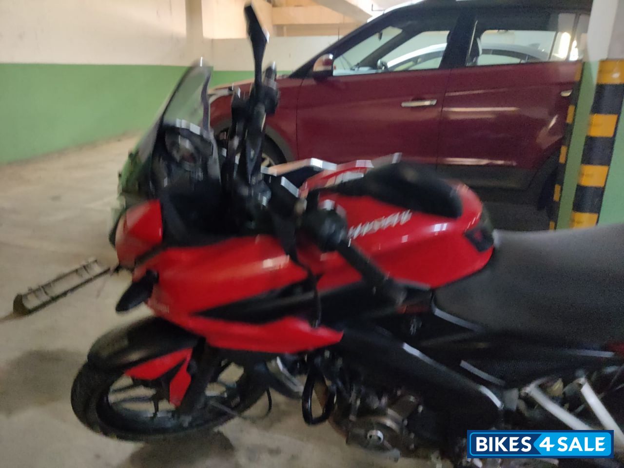 Red Bajaj Pulsar AS 200