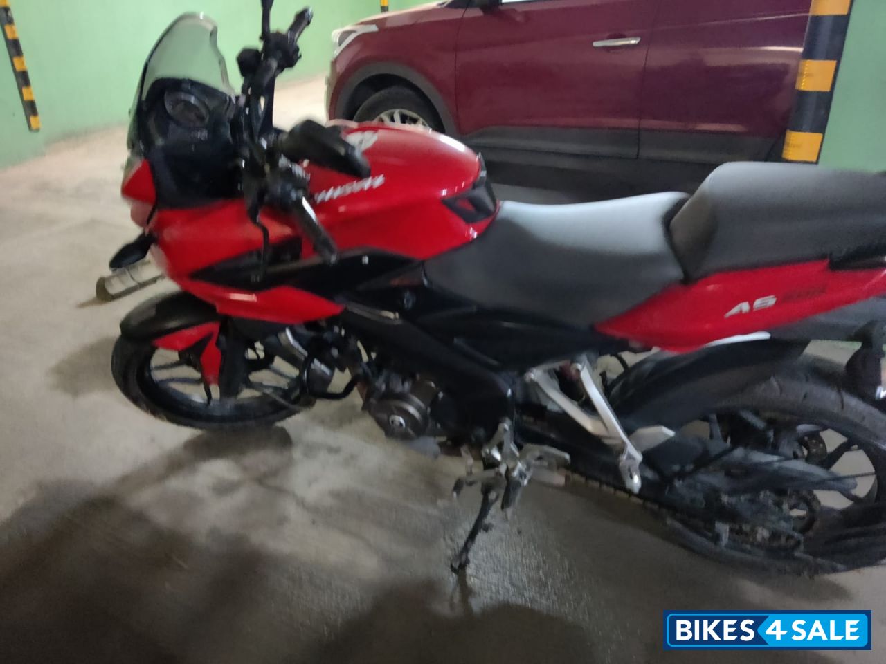 Red Bajaj Pulsar AS 200