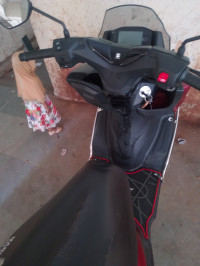 Red Suzuki Burgman Street Bluetooth Enabled