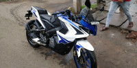White & Blue Bajaj Pulsar RS 200 ABS