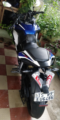 White & Blue Bajaj Pulsar RS 200 ABS