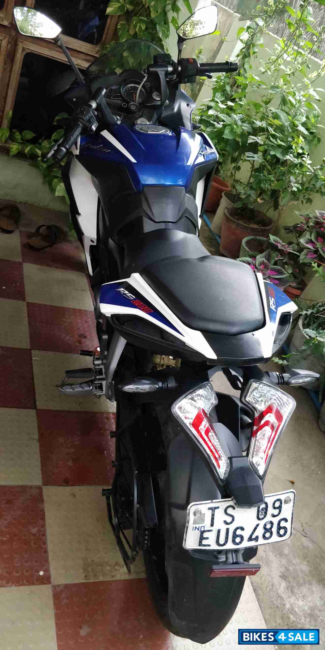 White & Blue Bajaj Pulsar RS 200 ABS