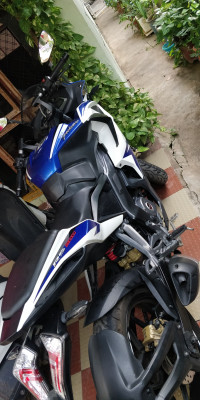 White & Blue Bajaj Pulsar RS 200 ABS