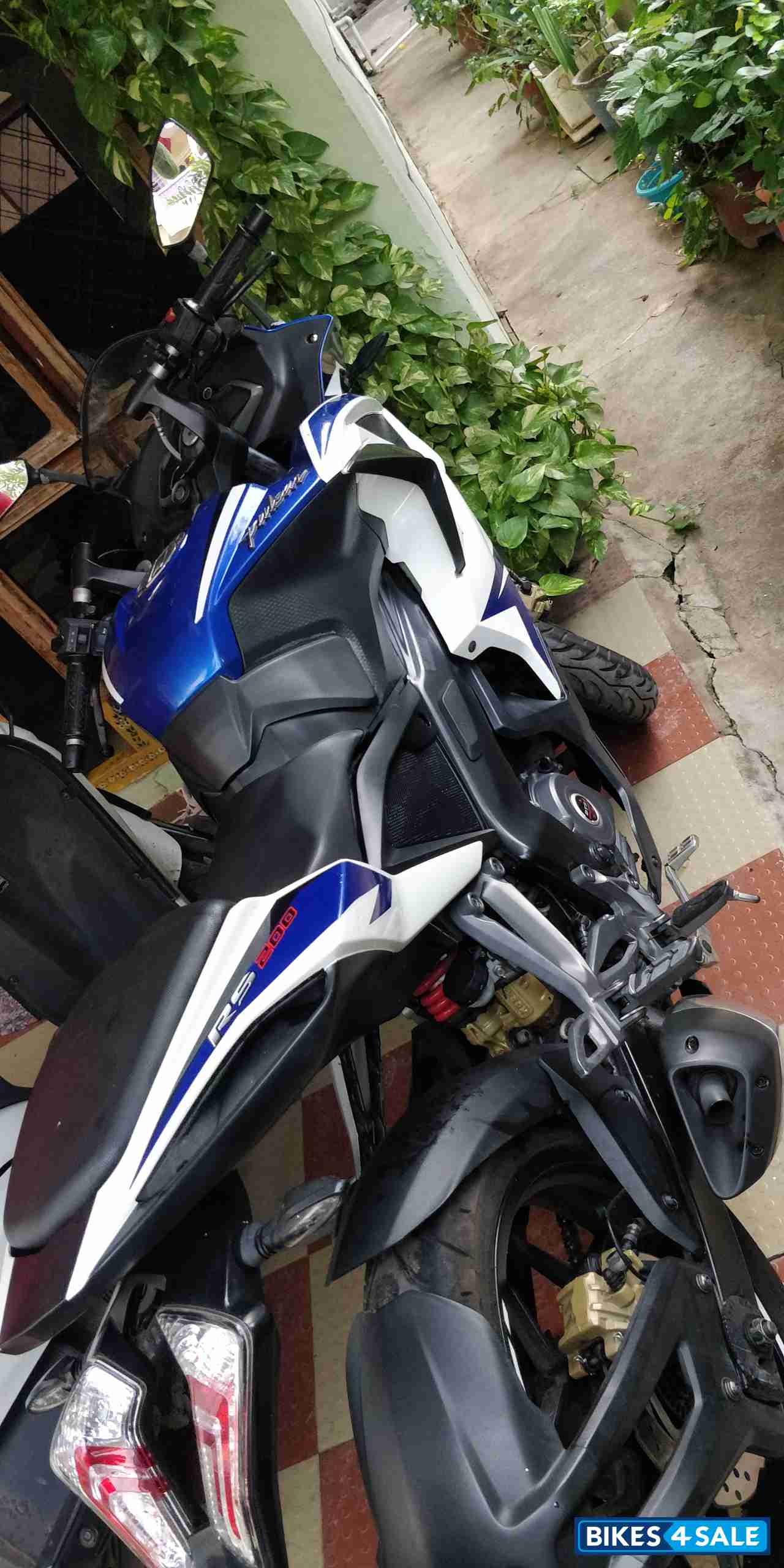 White & Blue Bajaj Pulsar RS 200 ABS