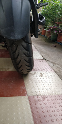 White & Blue Bajaj Pulsar RS 200 ABS