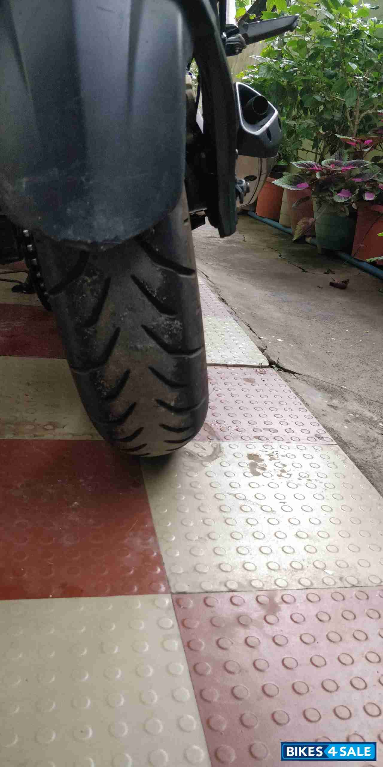 White & Blue Bajaj Pulsar RS 200 ABS