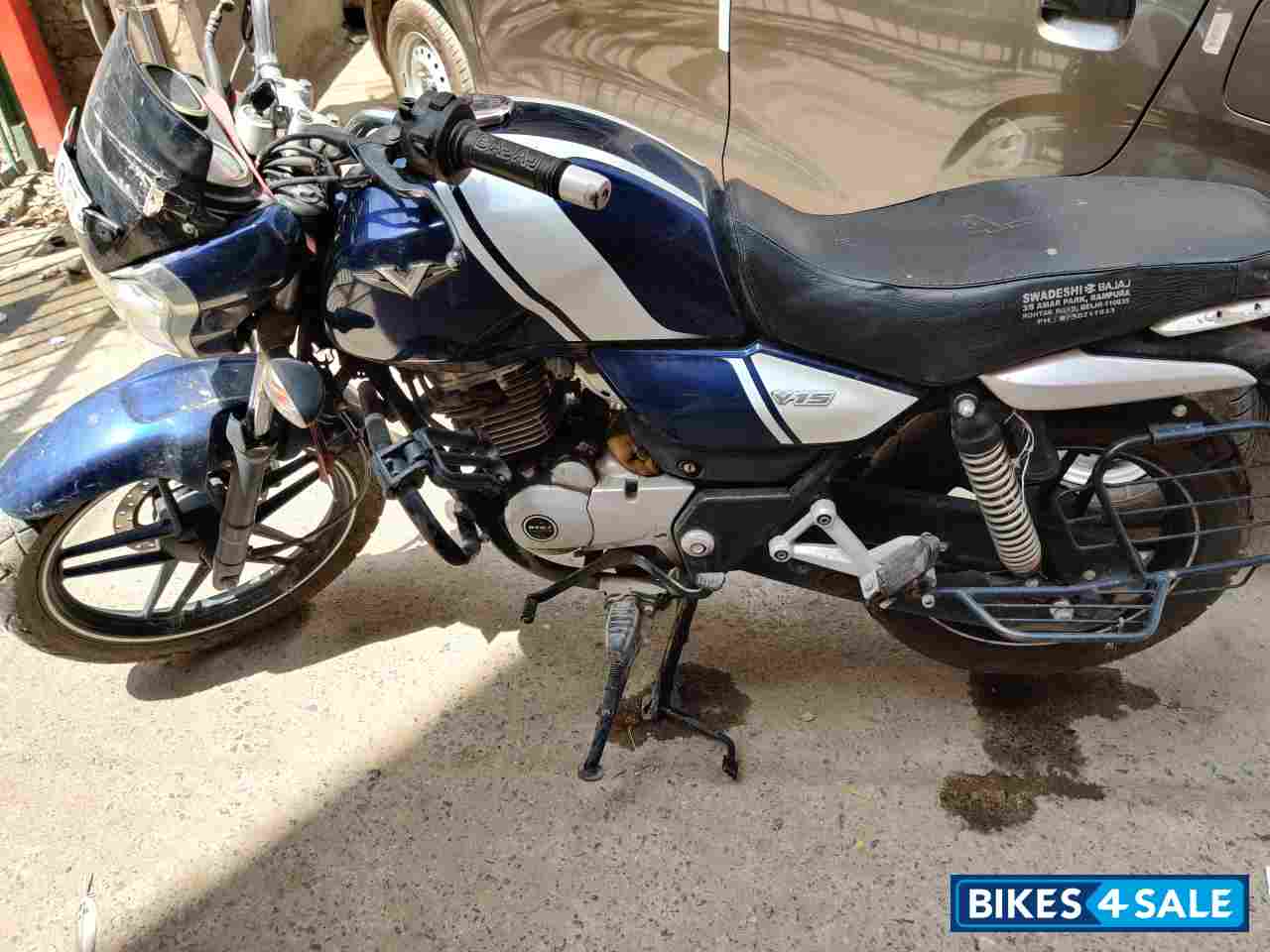 Blue White Bajaj V15