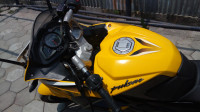 Yellow Bajaj Pulsar RS 200 ABS