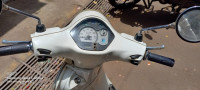 White Vespa LX 125