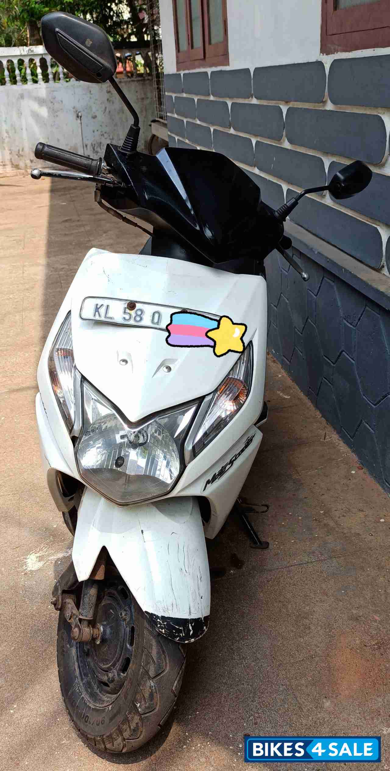 White & Black Honda Dio