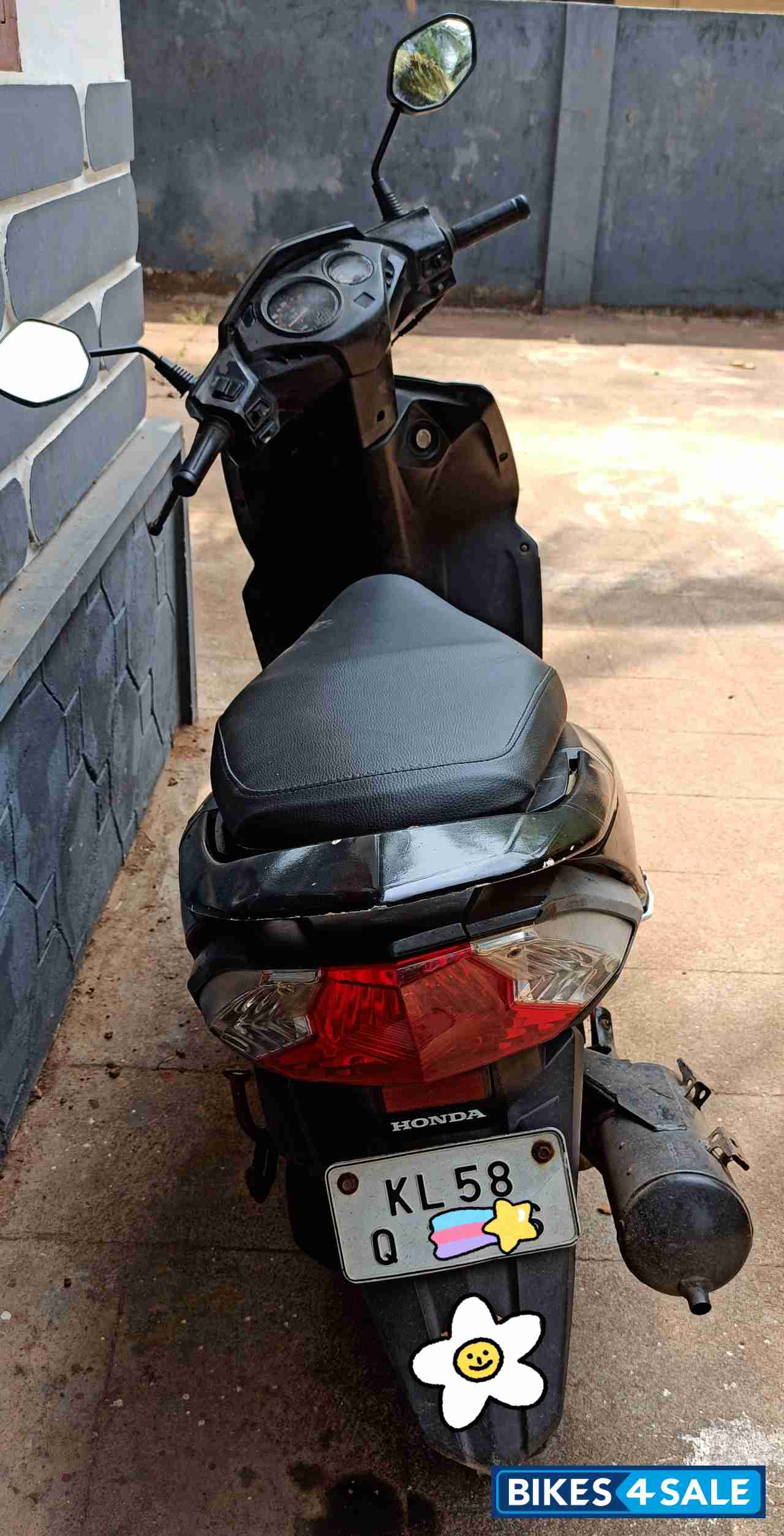 White & Black Honda Dio