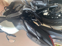 White Bajaj Dominar 400 Disc