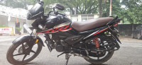 Red And Black Honda Livo