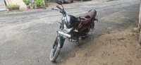 Red And Black Honda Livo
