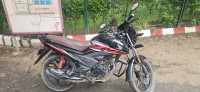 Red And Black Honda Livo