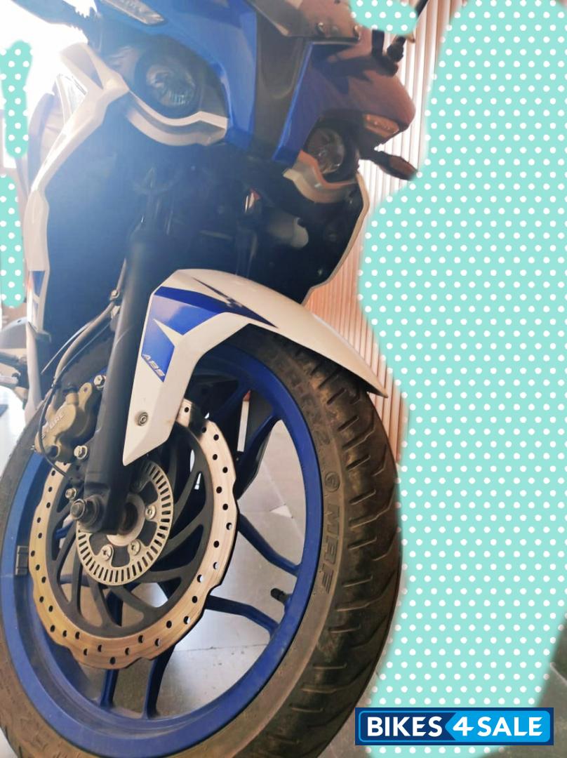 Blue/white Bajaj Pulsar RS 200 ABS