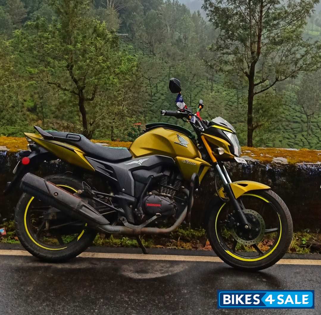 Lite Yellow Honda CB Trigger