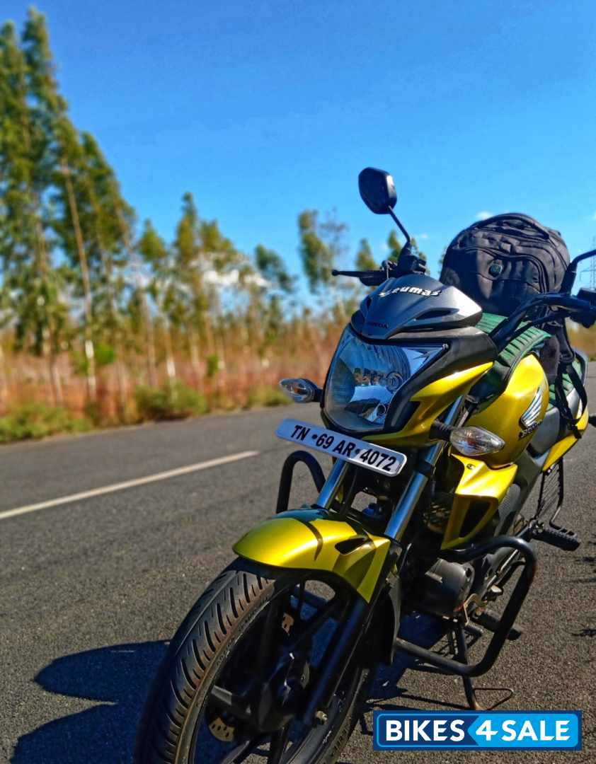 Lite Yellow Honda CB Trigger