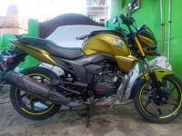 Lite Yellow Honda CB Trigger