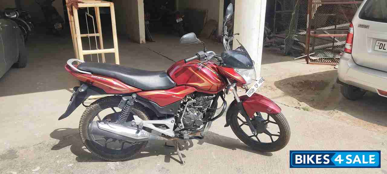 Mahron (red) Bajaj Discover 125M