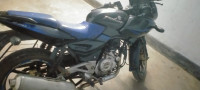 Black &blue Bajaj Pulsar 220 DTSFi