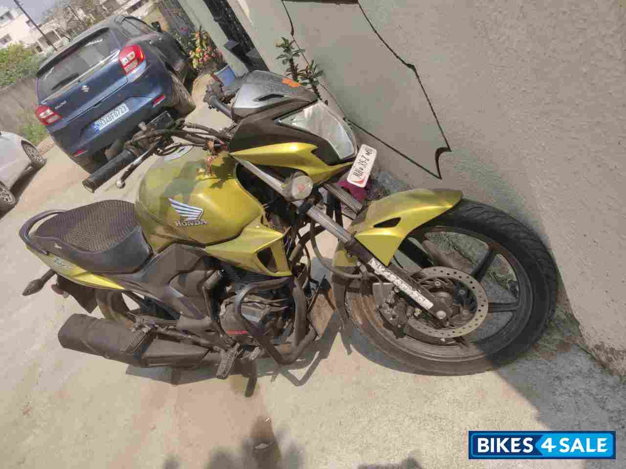 Yellow Honda CB Trigger