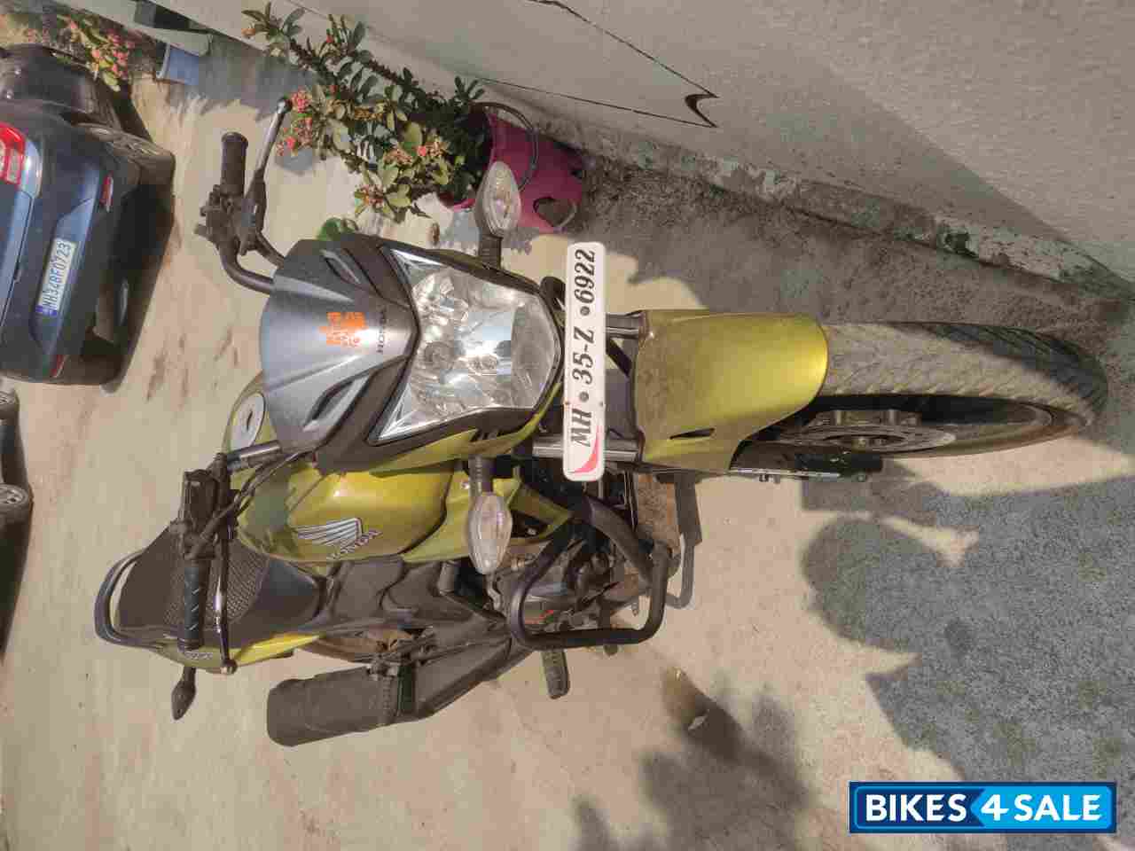 Yellow Honda CB Trigger