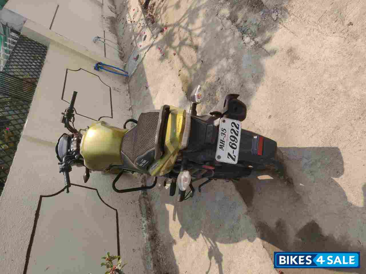 Yellow Honda CB Trigger