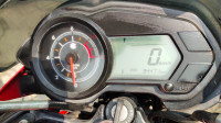 Red-black Bajaj Pulsar 135LS