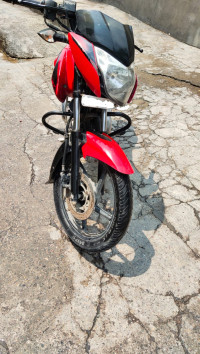 Red-black Bajaj Pulsar 135LS