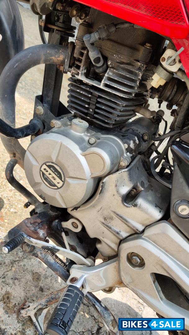 Red-black Bajaj Pulsar 135LS