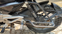 Red-black Bajaj Pulsar 135LS