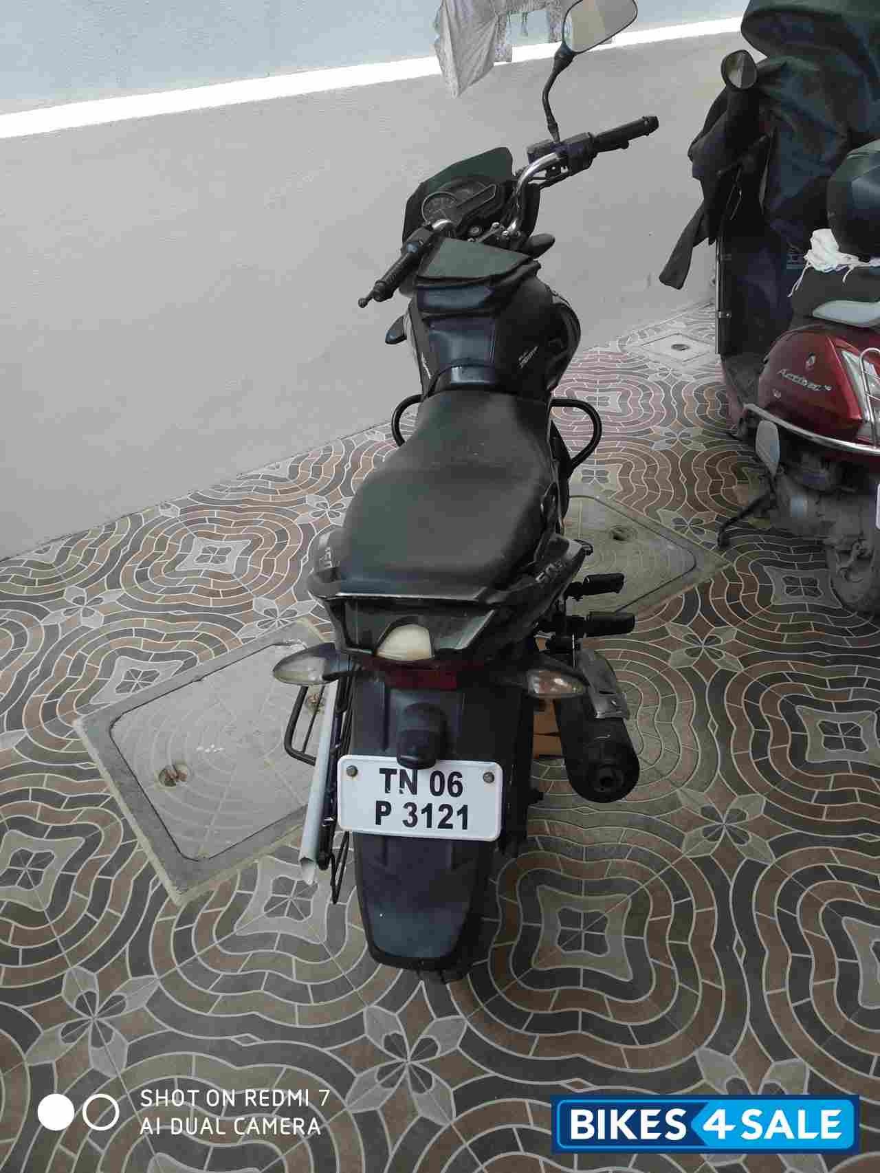Black Bajaj Discover 150 S