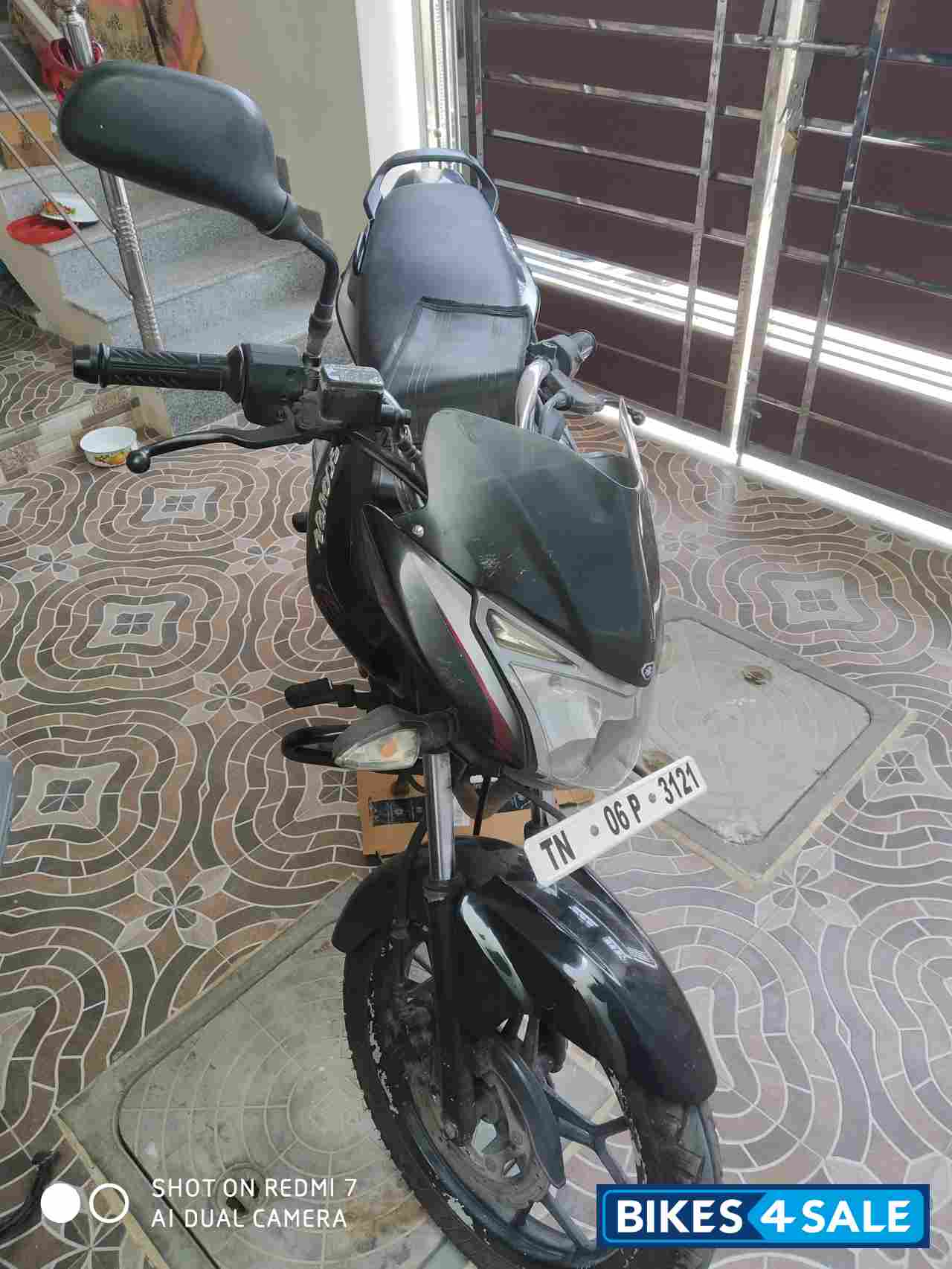 Black Bajaj Discover 150 S