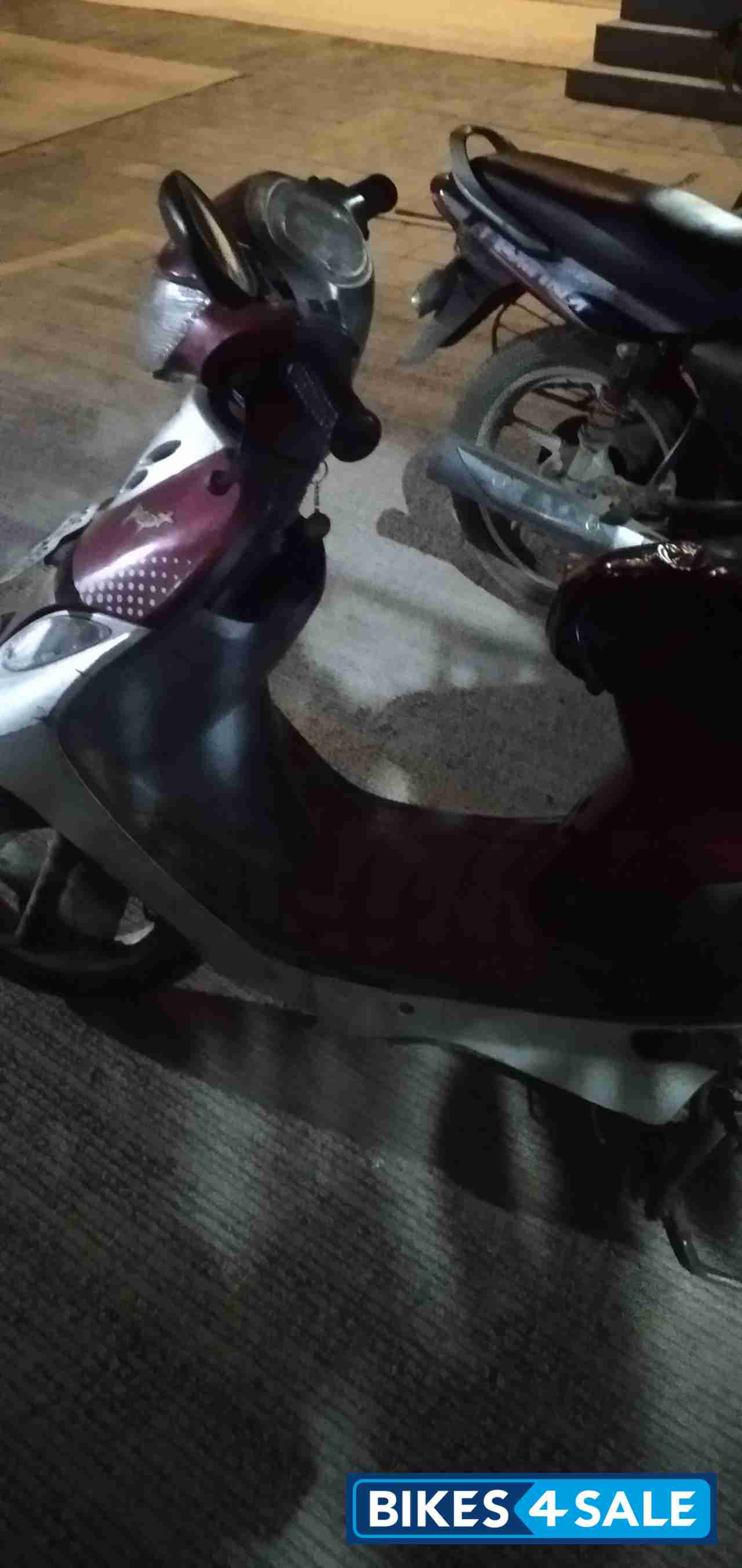 Maroon TVS Scooty Pep
