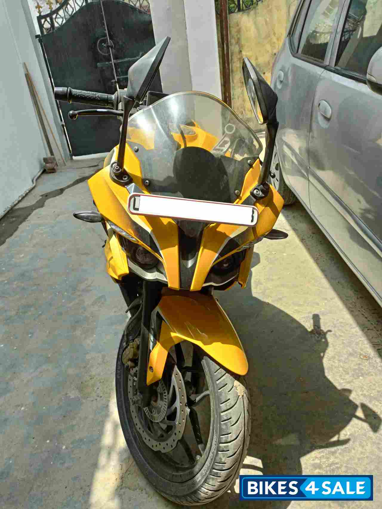 Yellow Bajaj Pulsar RS 200 ABS