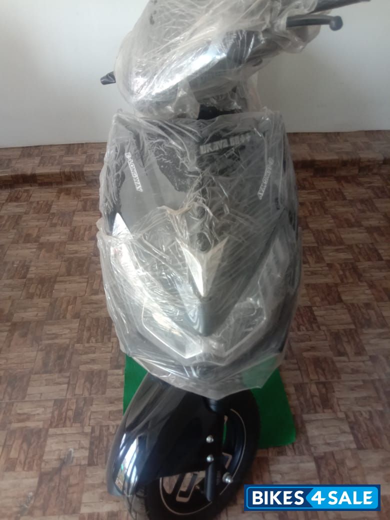 Grey, Black, White Ukava electric scooty
