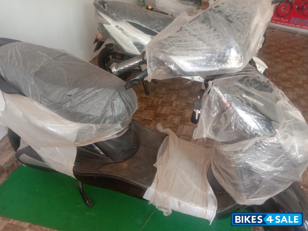 Grey, Black, White Ukava electric scooty