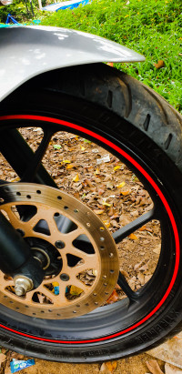 Candy Red Suzuki Gixxer SF SP