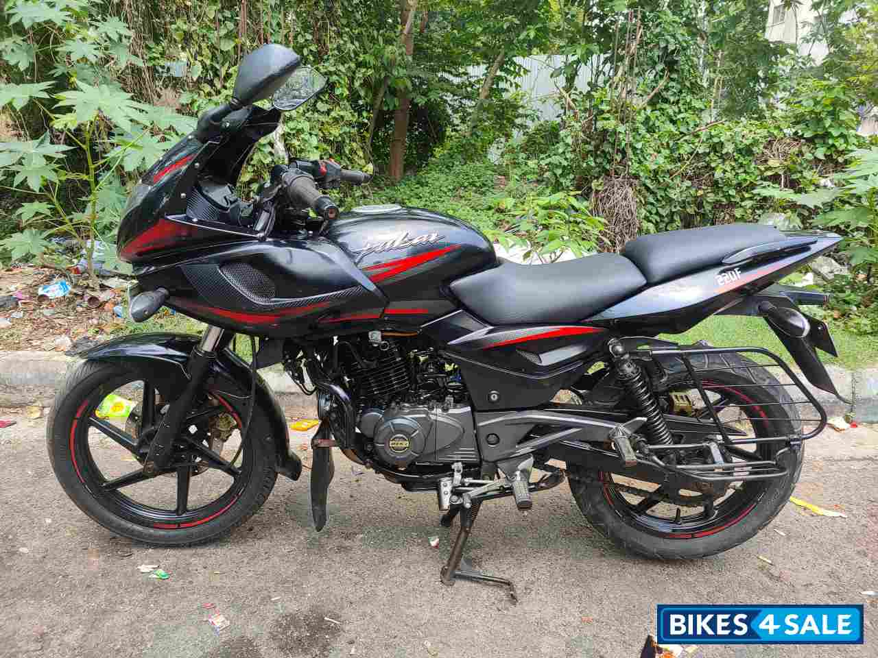 Black And Red Bajaj Pulsar 220 DTSi