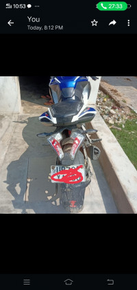 Blue And White Bajaj Pulsar RS 200 ABS