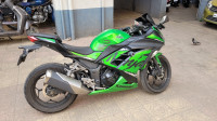 Green And Black Kawasaki Ninja 300R