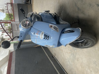 Blue Vespa LX 125
