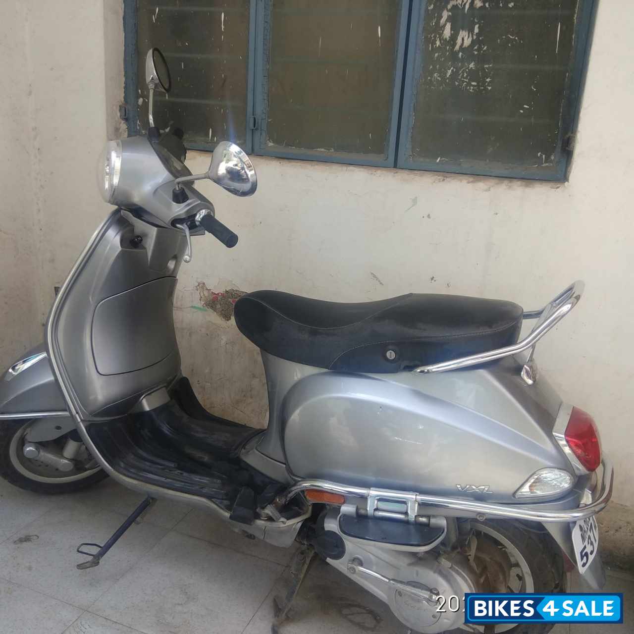 Silver Vespa VXL 125