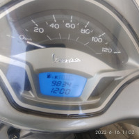 Silver Vespa VXL 125