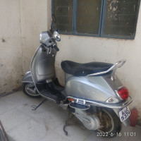 Silver Vespa VXL 125