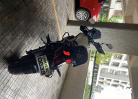 White Bajaj Dominar 400 Disc