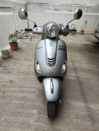 Silver Vespa VX 125