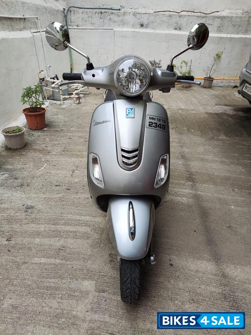 Silver Vespa VX 125