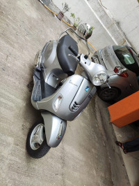 Silver Vespa VX 125